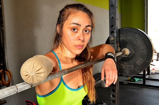 One-Armed Weightlifter Continues To Lift After Amputation